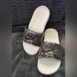 Nike python/white ladies slides. Size 7. Worn twice. $30.
